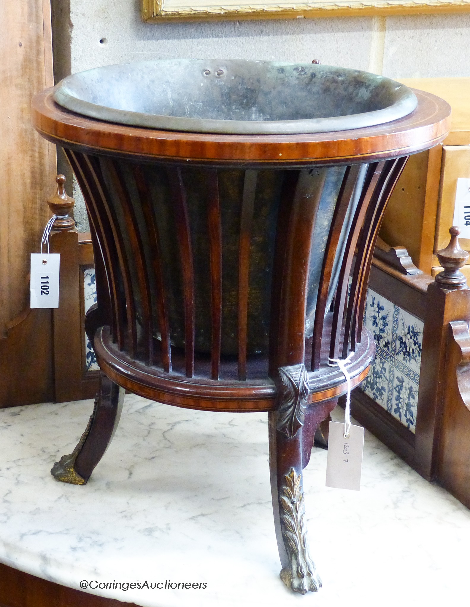 An Edwardian satinwood banded mahogany jardiniere. D-40, H-43cm.